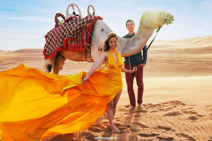 Step into an unforgettable desert landscape where flowing dresses and stunning dunes create the perfect backdrop for exceptional photo and video moments in Dubai.